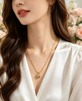 COLLAR CORAZON GLOBITO DORADO
