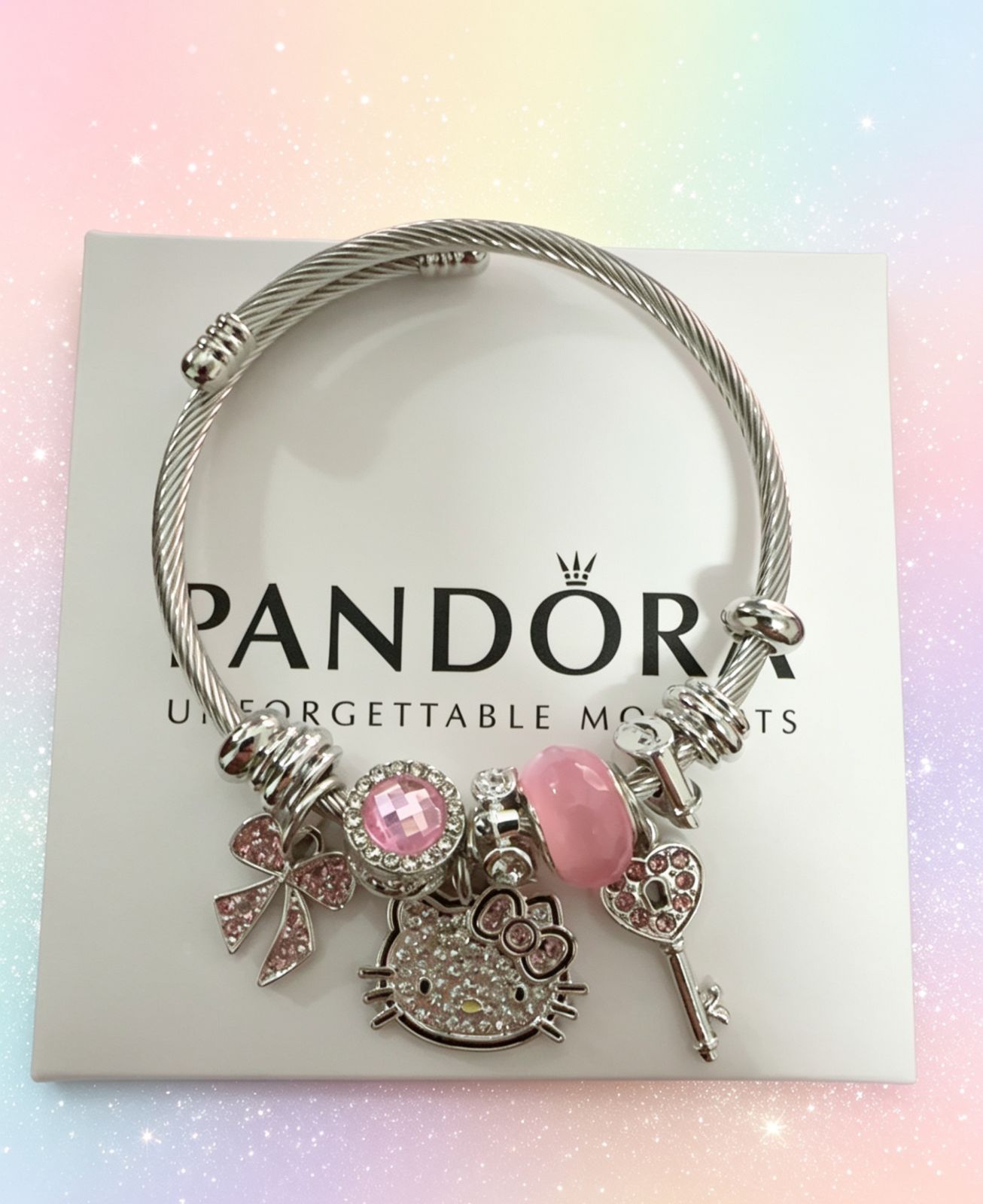 PULSERA DE HELLO KITTY PLATEDA CON ROSA